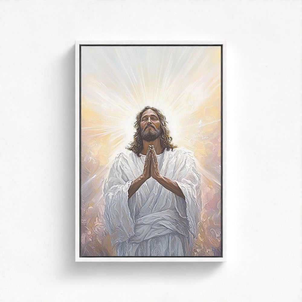 painting of Jesus beautifully float framed in white, highlighting the divine glow and serene expression of Christ in prayer